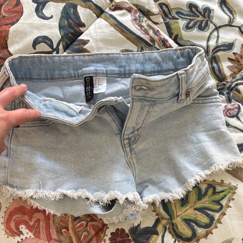 Divided Frayed Hem Light Blue Jean Shorts